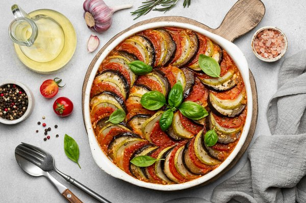 Quels sont les secrets pour une ratatouille niçoise avec des légumes confits et savoureux?